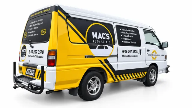 Side and rear of a Mac’s Auto Clinic van with a circular logo and a black service-list panel.